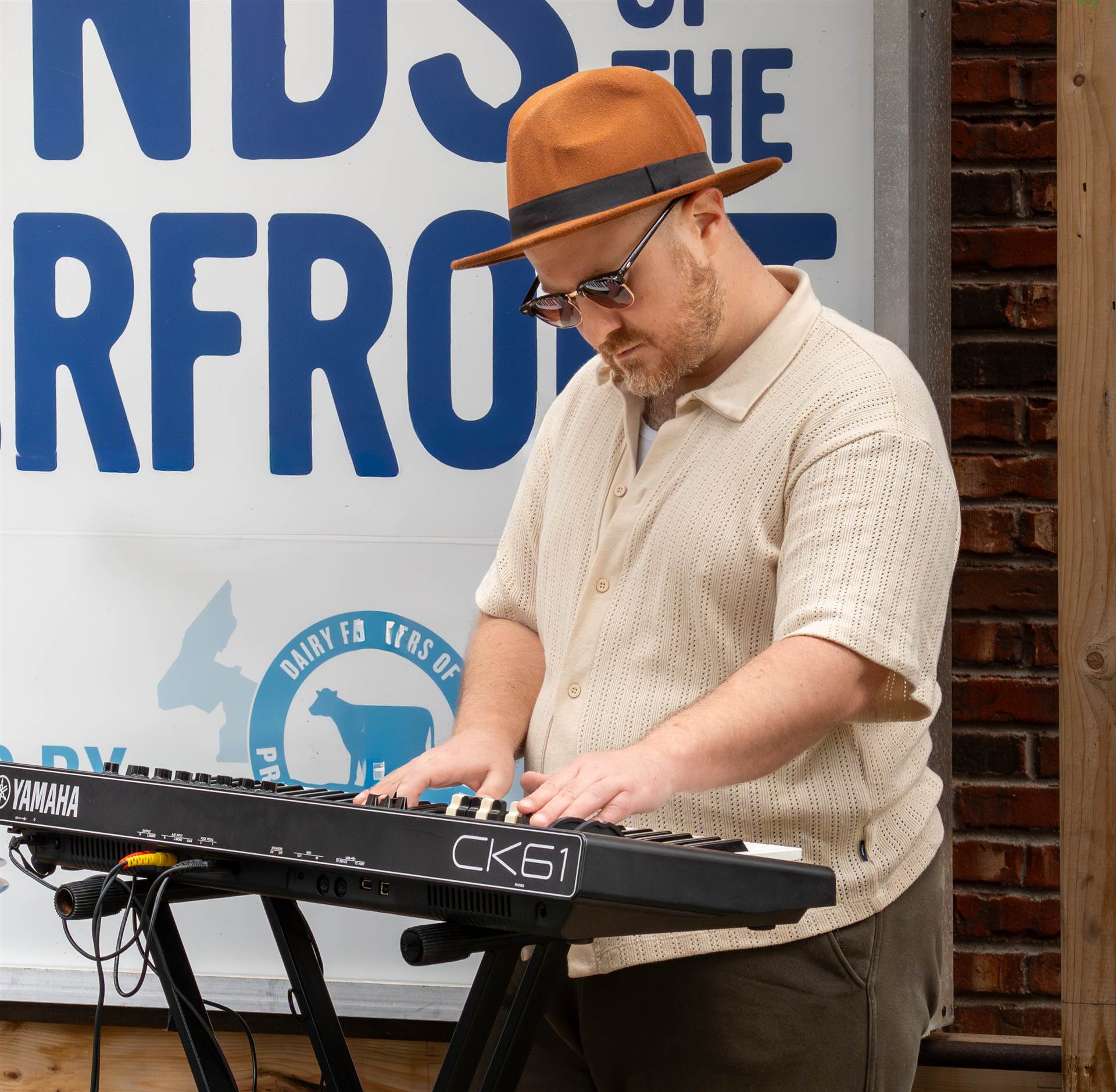 Musicians playing live at a lively Prince Edward Island outdoor concert - Eastside Photography band promo