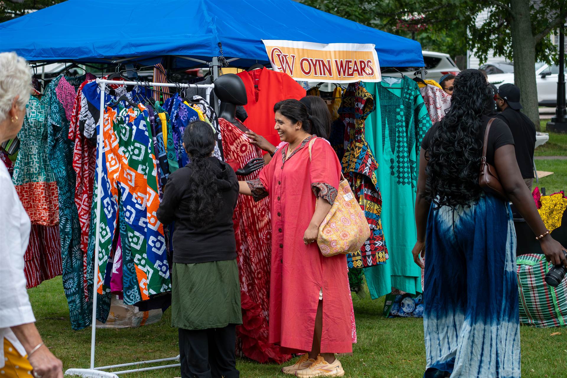 Packed crowd dancing and enjoying live music atmosphere at a major Prince Edward Island summer festival - Eastside Photography