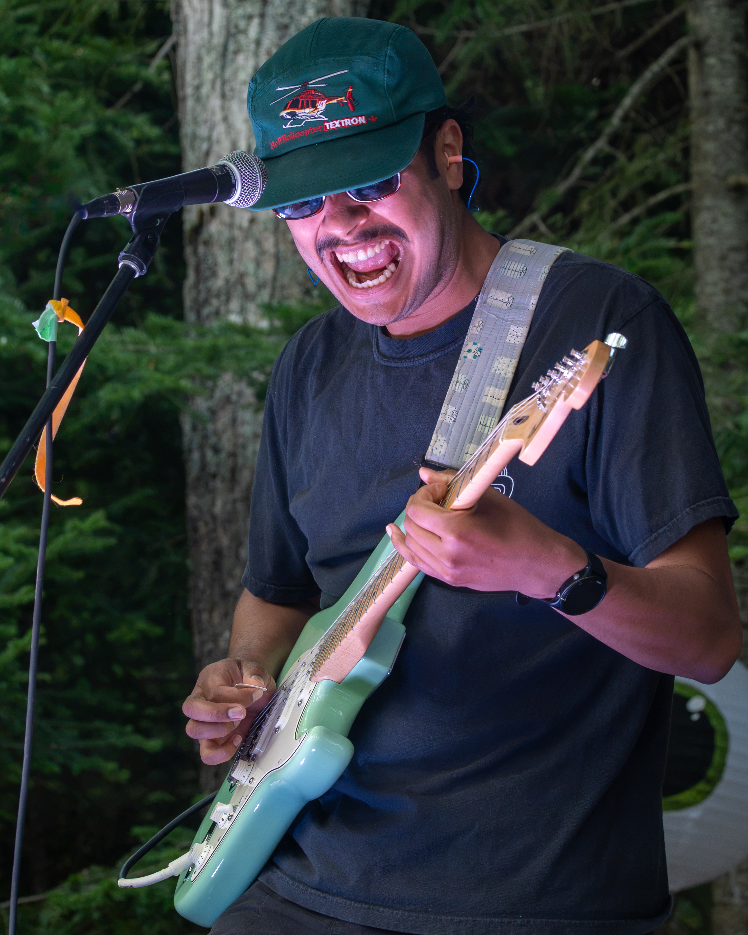 Professional guitarist performing a live outdoor music set in Prince Edward Island - Eastside Photography event coverage