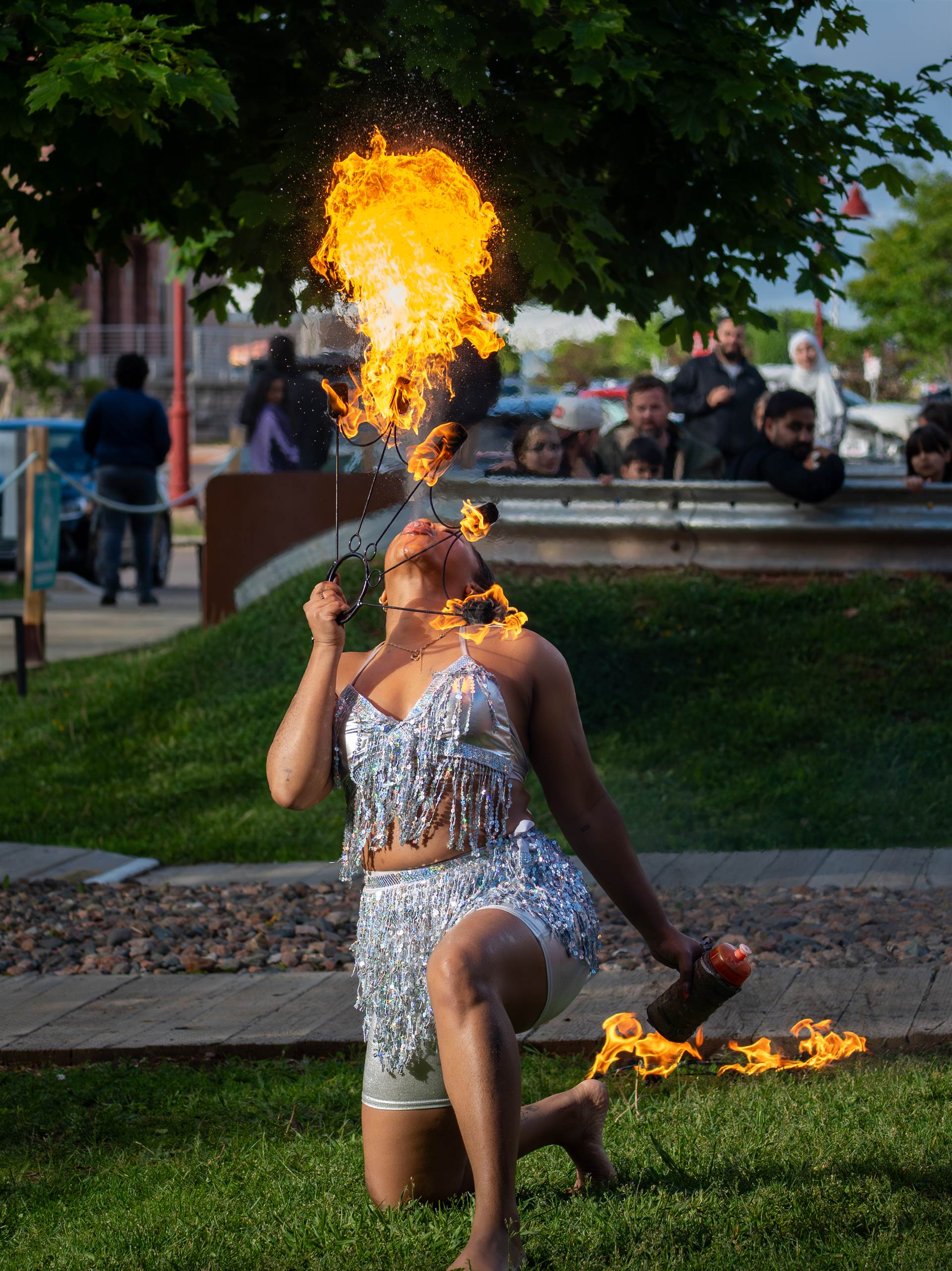 Spectacular fire breathing performance under night sky at PEI street festival - Eastside Photography