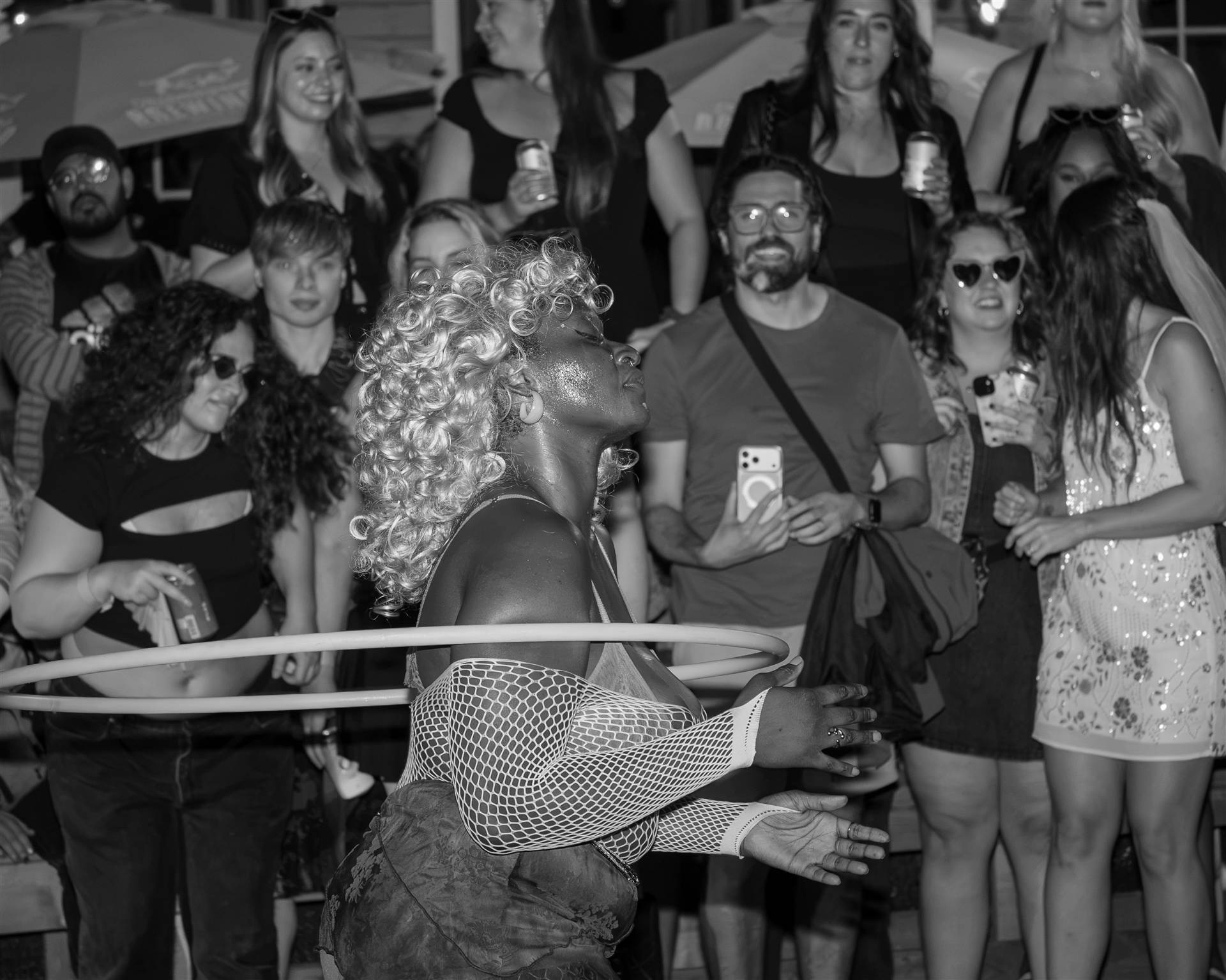 Packed crowd dancing and enjoying live music atmosphere at a major Prince Edward Island summer festival - Eastside Photography