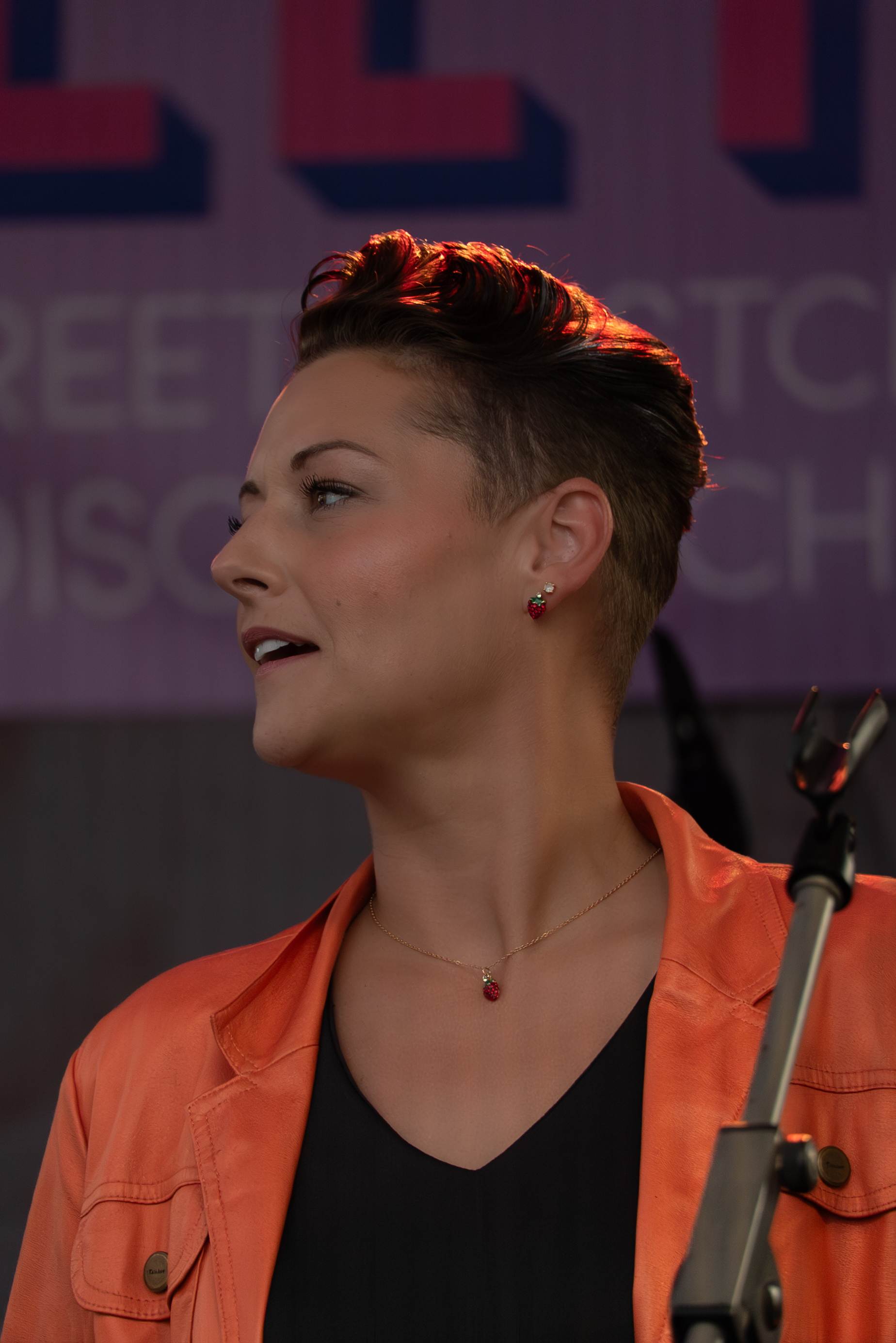 Lead female vocalist singing live on stage at PEI music event - Eastside Photography