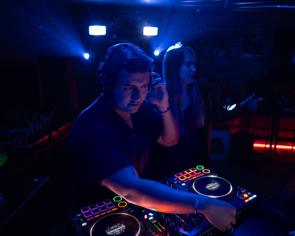 Vocalist or DJ promotional photo session under deep blue neon spotlight on Prince Edward Island - Eastside Photography