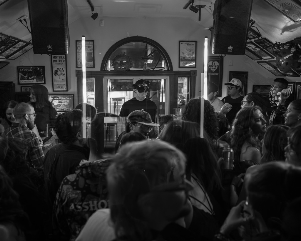 High-angle wide shot of a packed Charlottetown club dance floor dancing to a DJ set - Eastside Photography event coverage