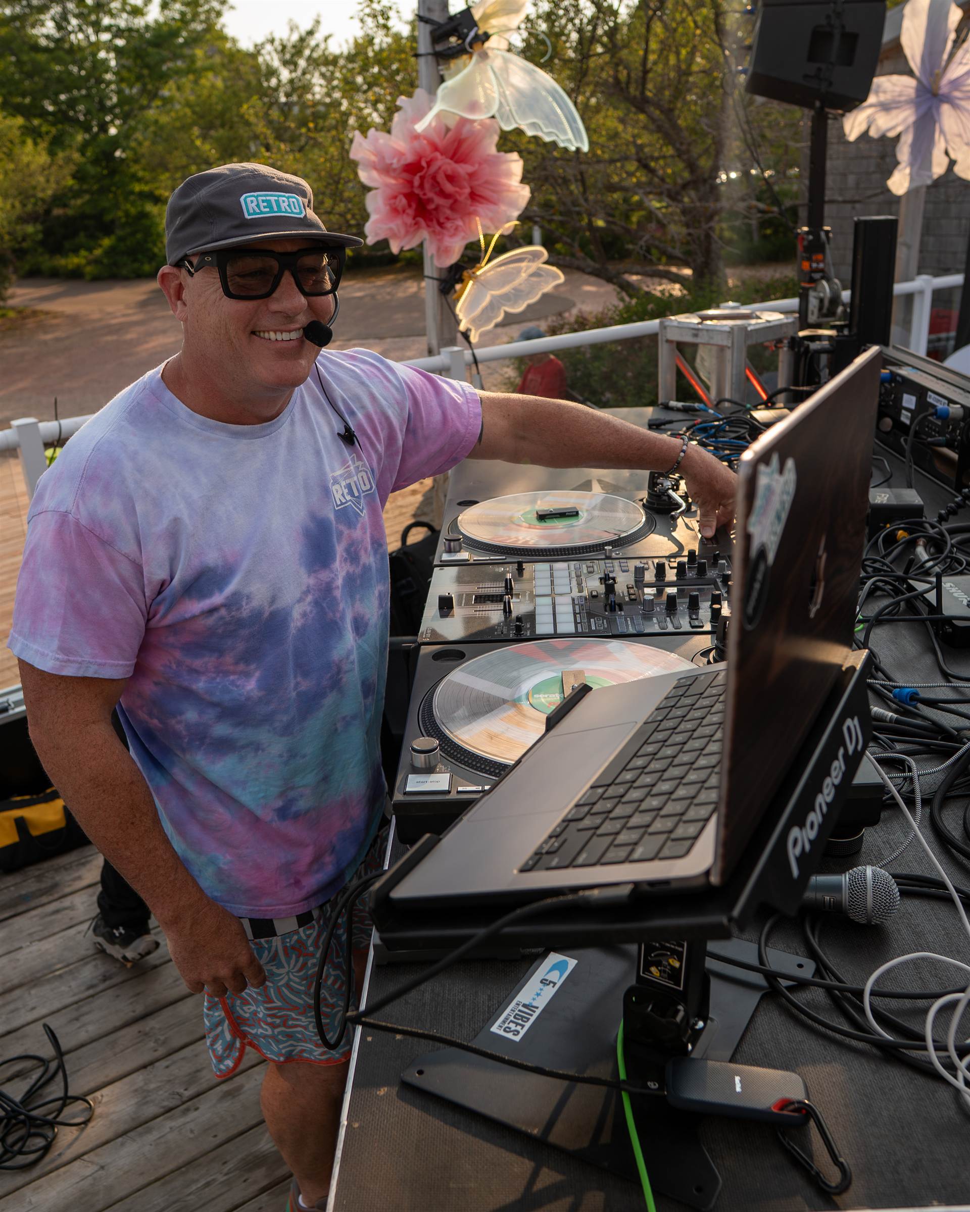 Smiling DJ at Green Gables musical sign double-exposure Charlottetown PEI - Eastside Photography
