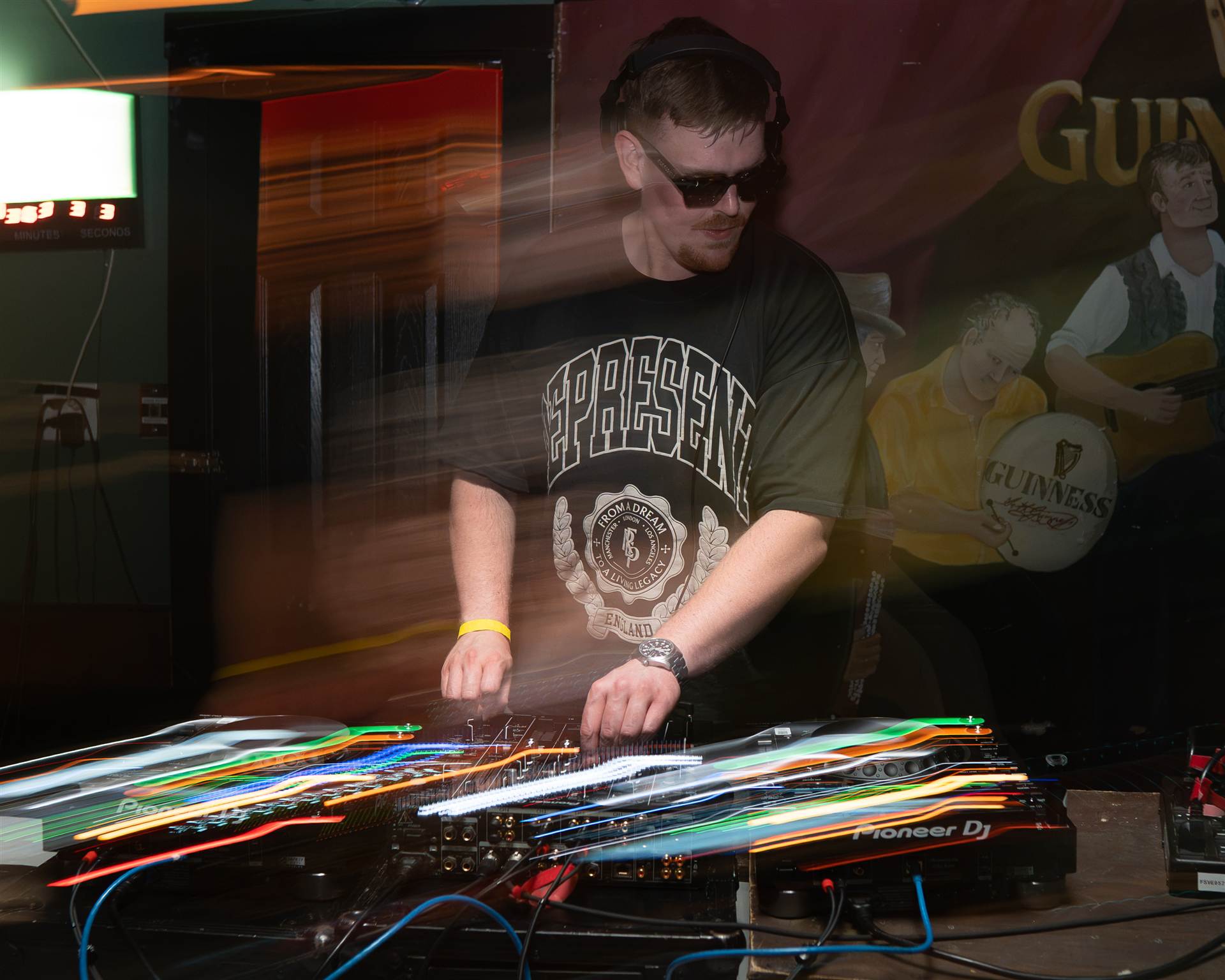 DJ in white IAAB tee sunglasses double-exposure waterfront Sundrift Festival PEI - Eastside Photography